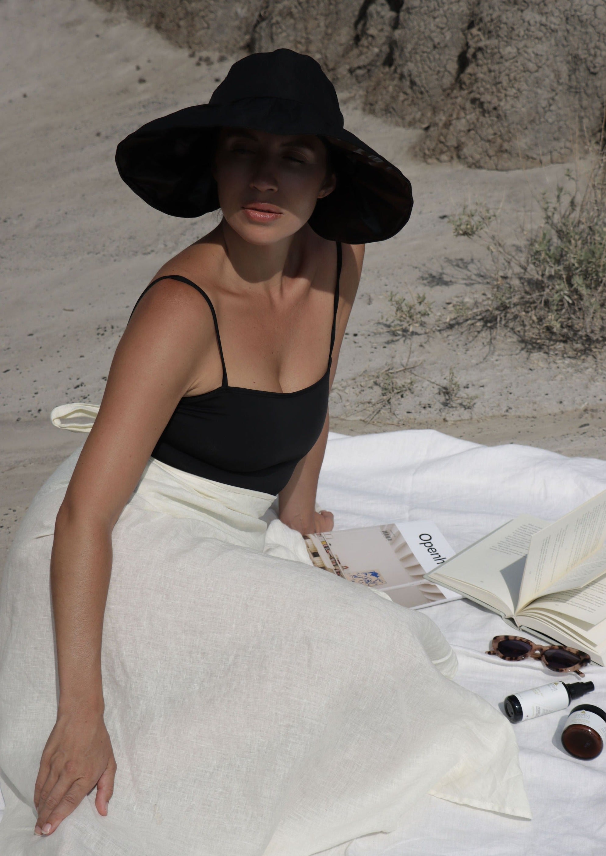 UV blocking sun hat that is adjustable to fit you perfectly. Features an opening at the back for a ponytail or whatever hair style you choose. Rolls up and is completely packable and light, perfect for travel or daily use for sun protection.