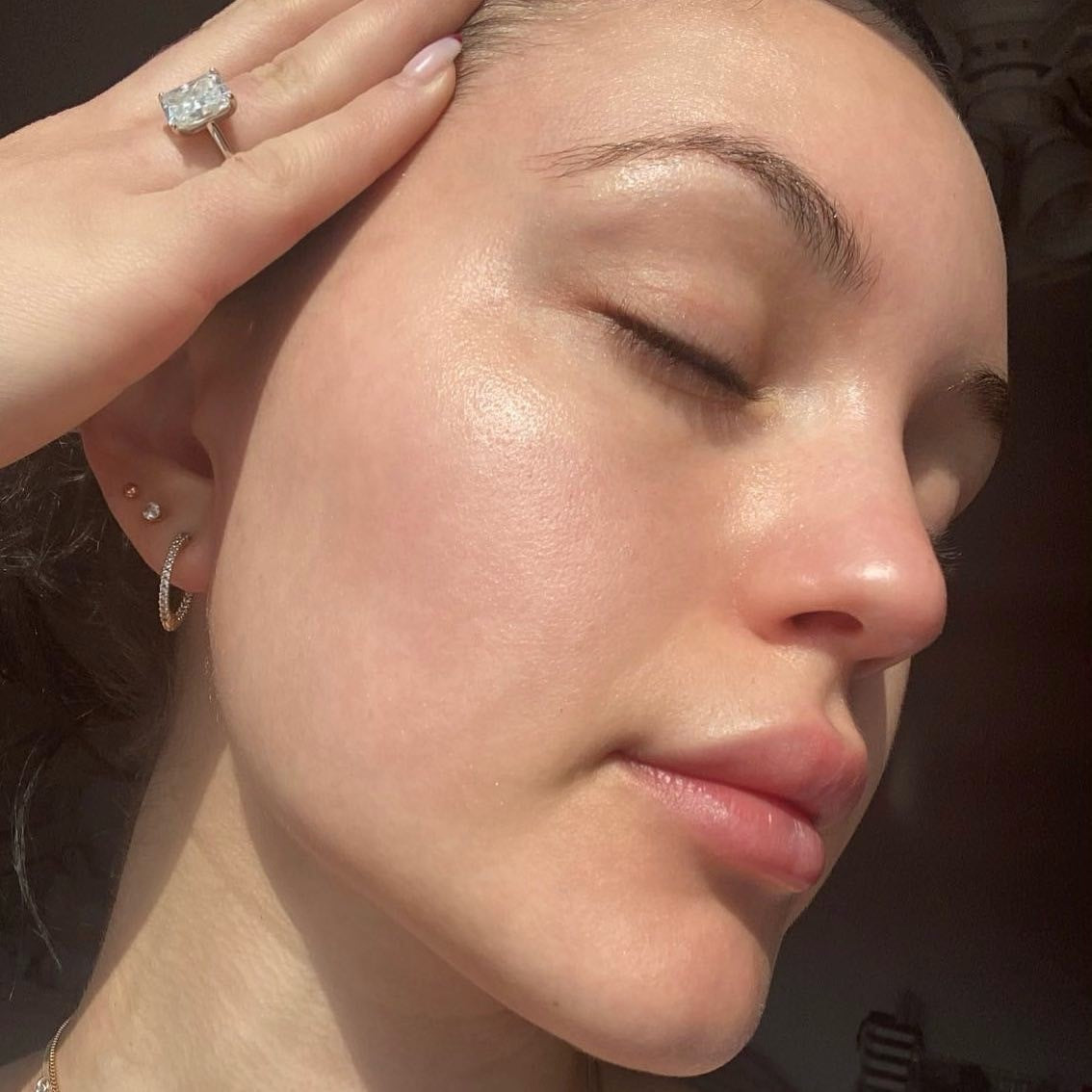 Mimi showing her glowing skin after using Iremia Skincare's Soothing Lotion and Restorative Facial Oil for sensitive skin.